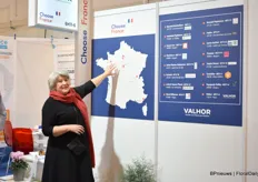 Jocelyne Kerjouan showing where the growers are from that are participating at the French pavillion. Most are from around Angers .